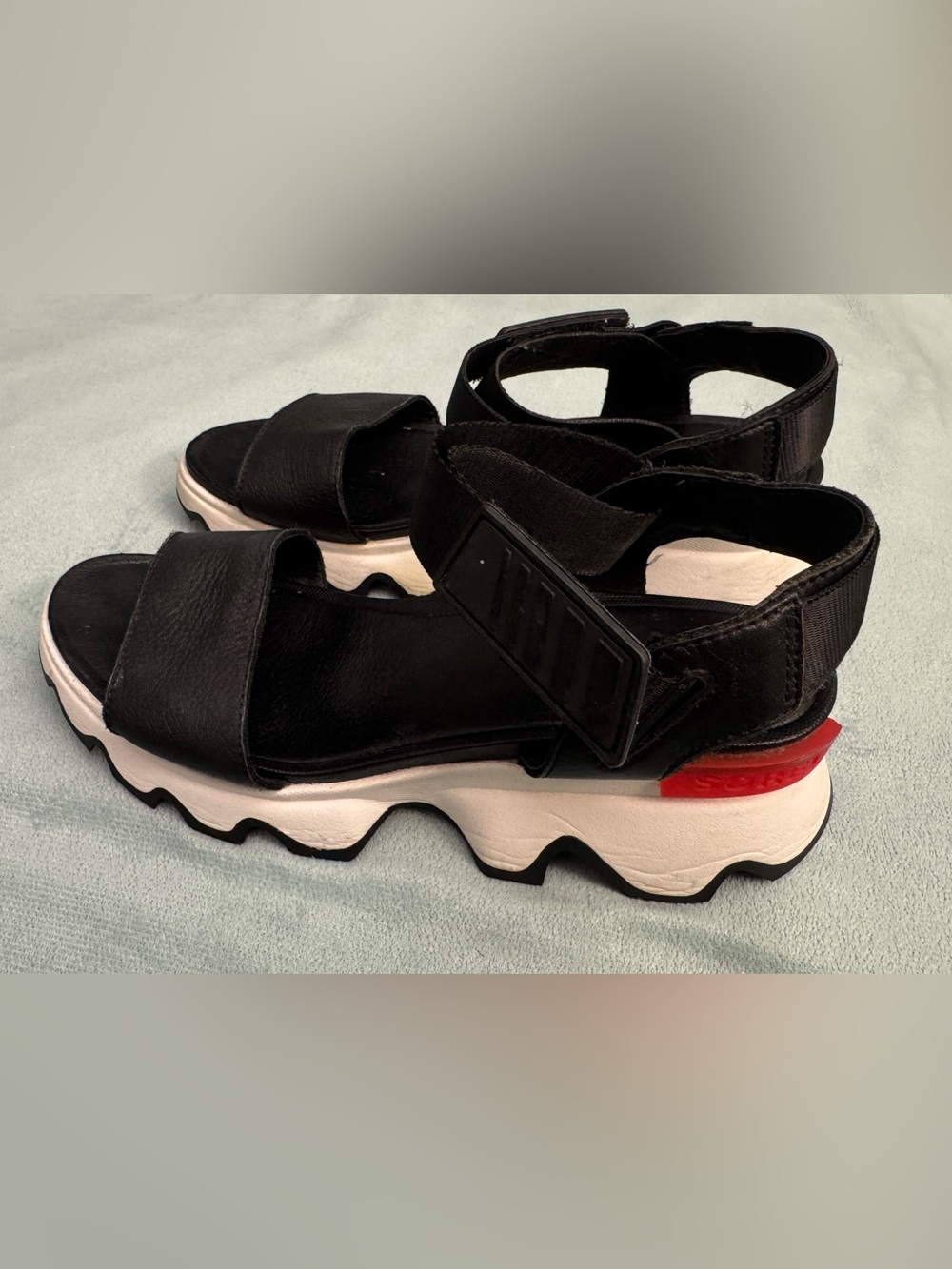 Sorel Black Sandals with White Chunky Sole and Red Heel Accent